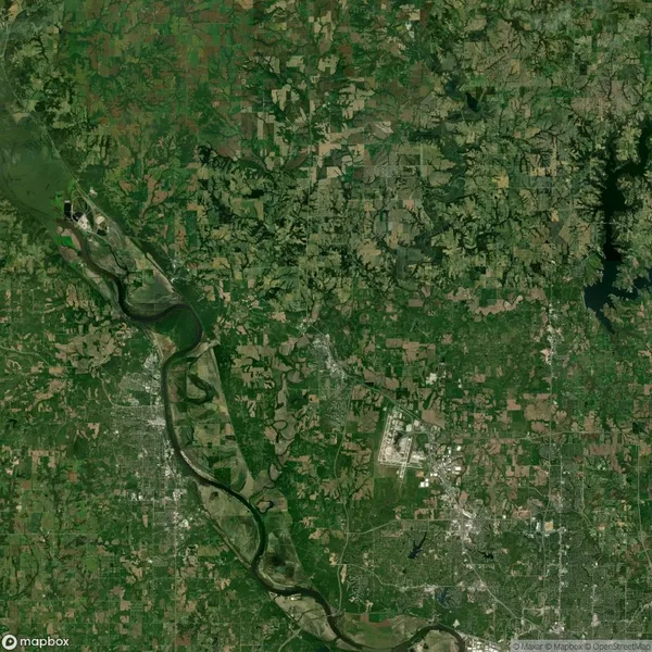 Satellite image of a landscape featuring a winding river, agricultural fields, and urban areas. The river flows from top to bottom on the left side of the image.