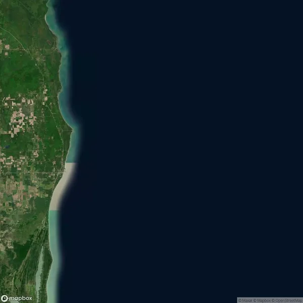 Satellite map showing a section of green land on the left and a large body of dark blue water on the right, separated by a narrow strip of shoreline.