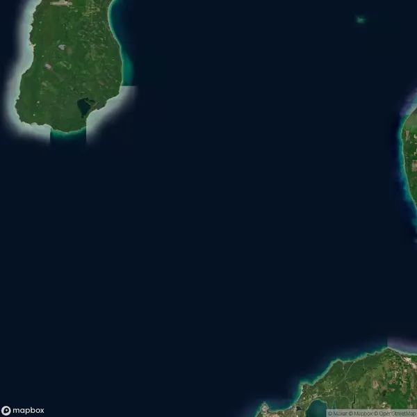 Satellite view of the Straits of Mackinac, showing Michigan’s Lower Peninsula at the bottom and Upper Peninsula at the top left, separated by water.